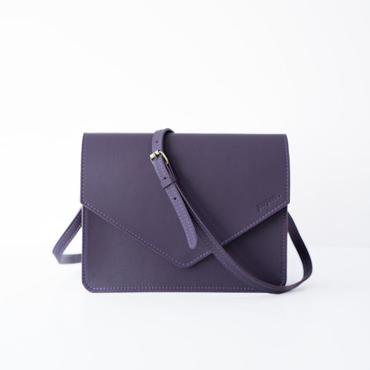 Lederen handtas in donkerpaars