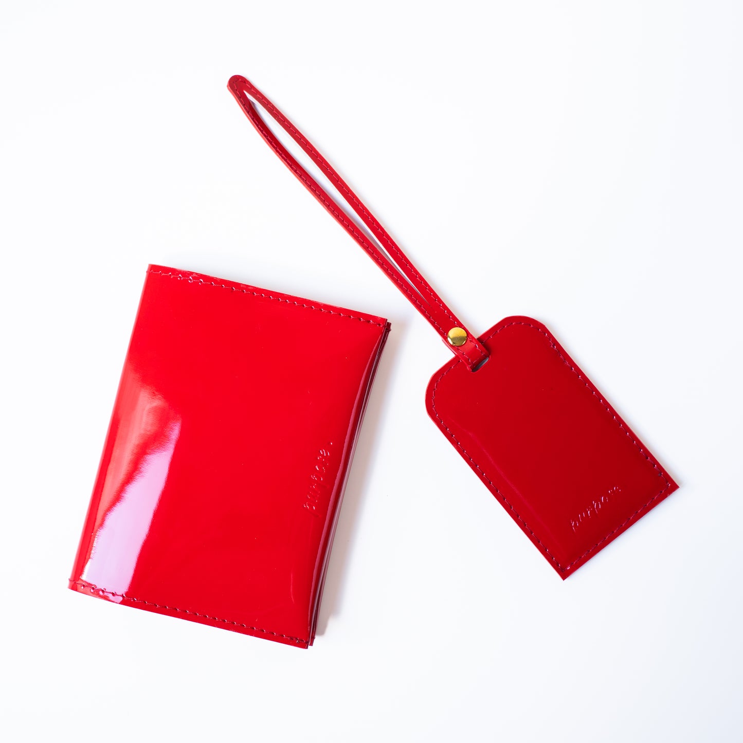 Paspoort en bagagelabel rood leer set
