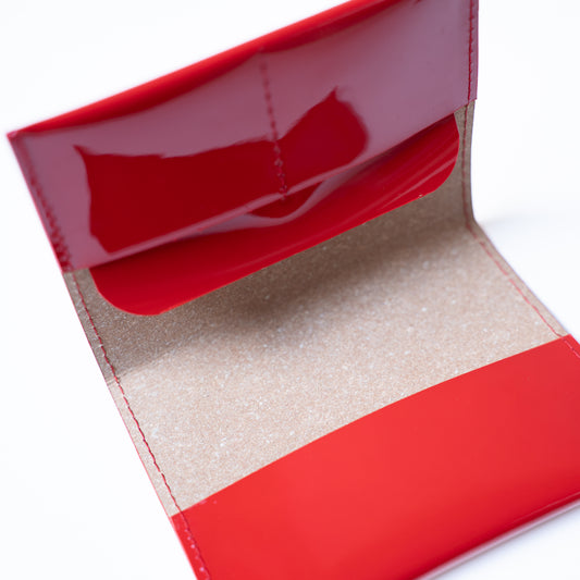 Paspoorthoes in leer rood binnenkant