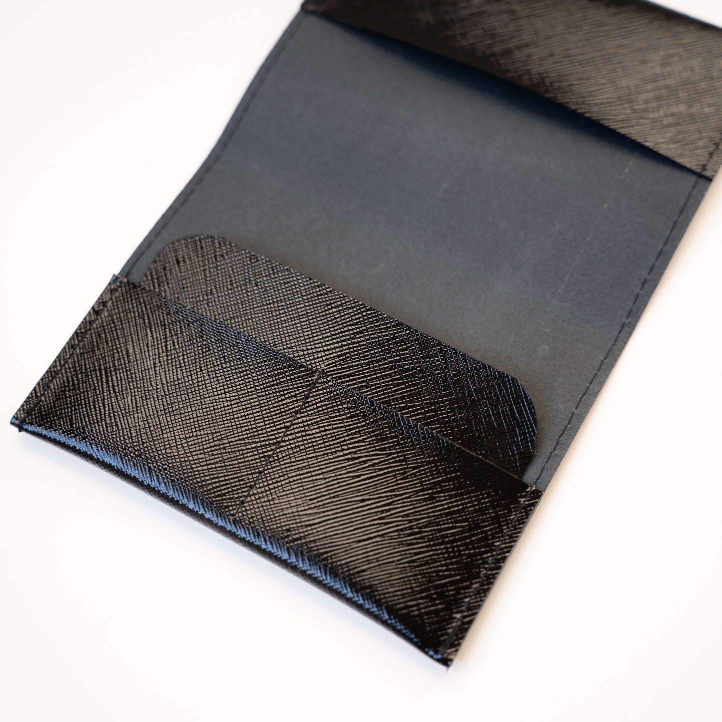 Paspoorthoes in leer zwart binnenkant