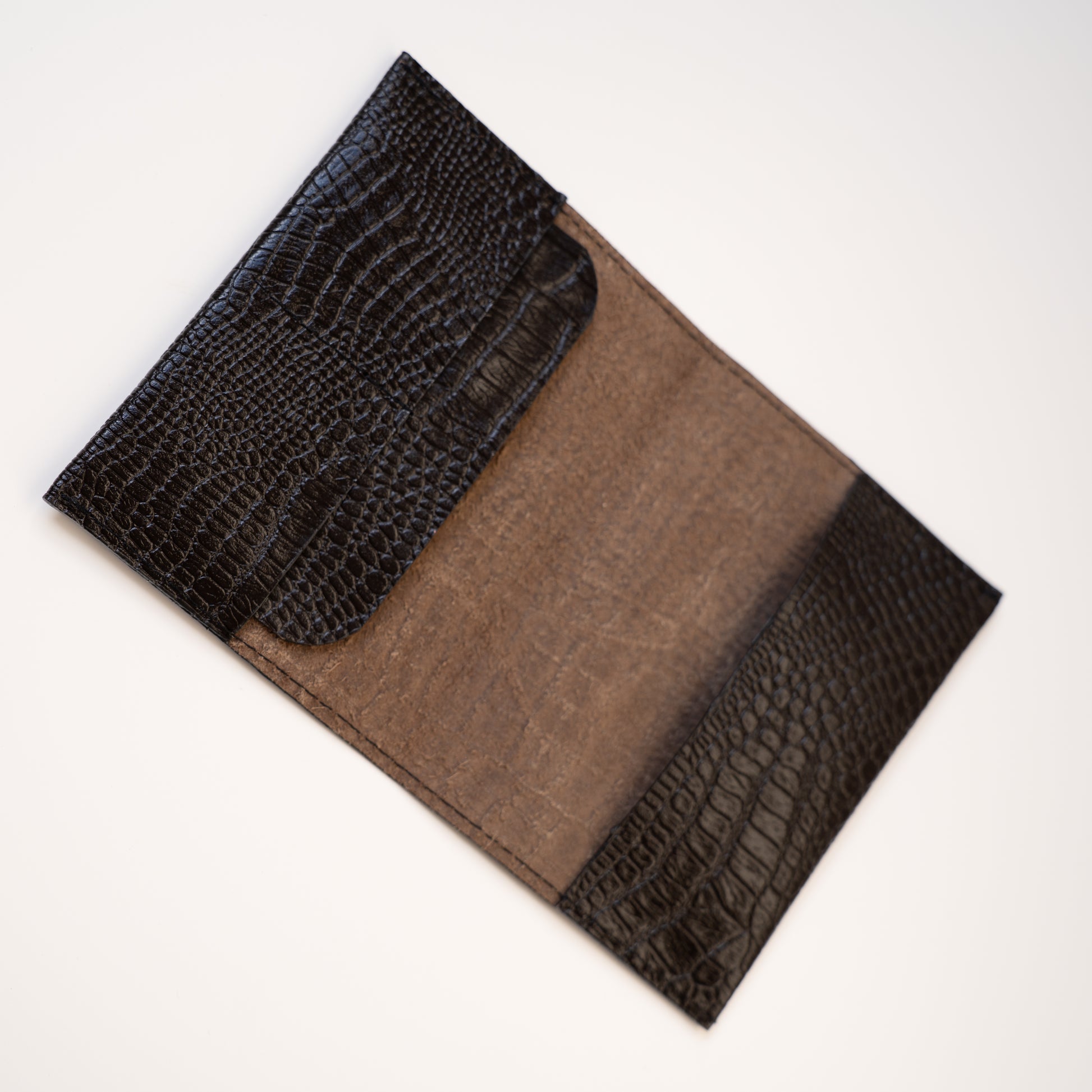 Paspoorthoes bruin binnenkant